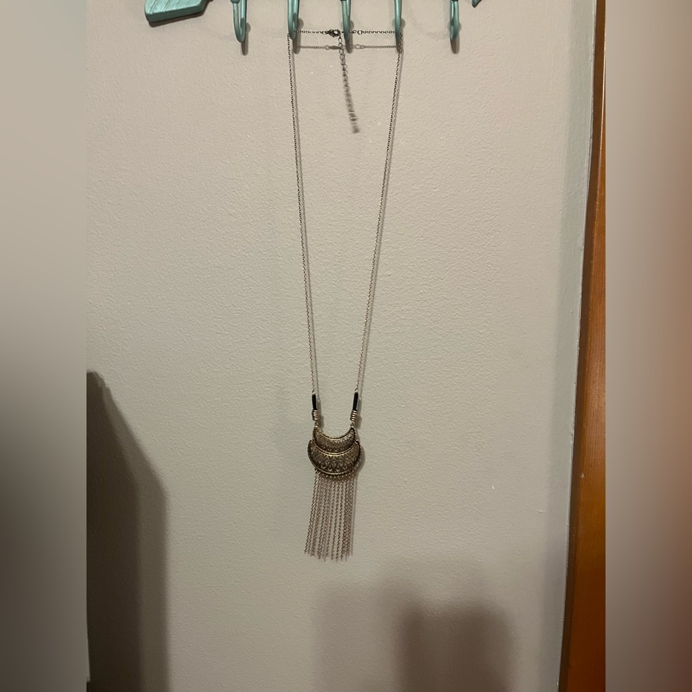 Long gold necklace